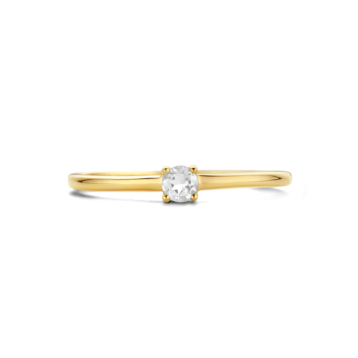 Zijaanzicht van de gouden geboortesteen ring met zirkonia van 14 karaat.