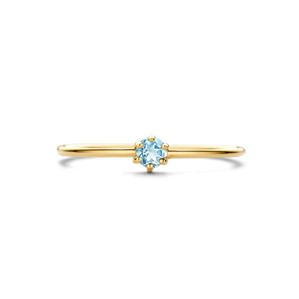 Bovenaanzicht van de gouden geboortesteen ring met aquamarijn van 14 karaat.