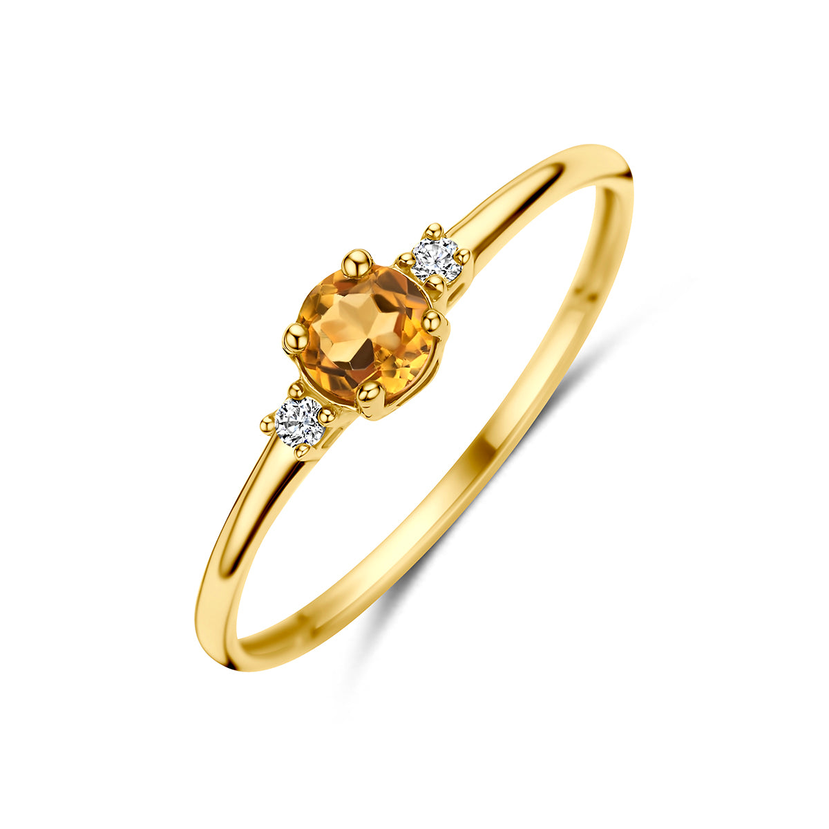 Schuin bovenaanzicht van de gouden ring met citrien en zirkonia van 14 karaat.