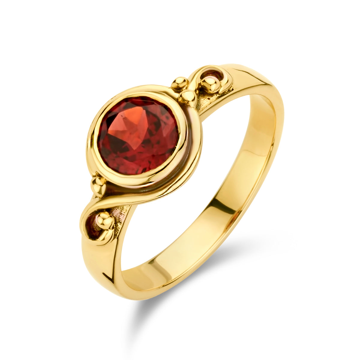 Schuin bovenaanzicht van de gouden vintage ring met granaat van 14 karaat.