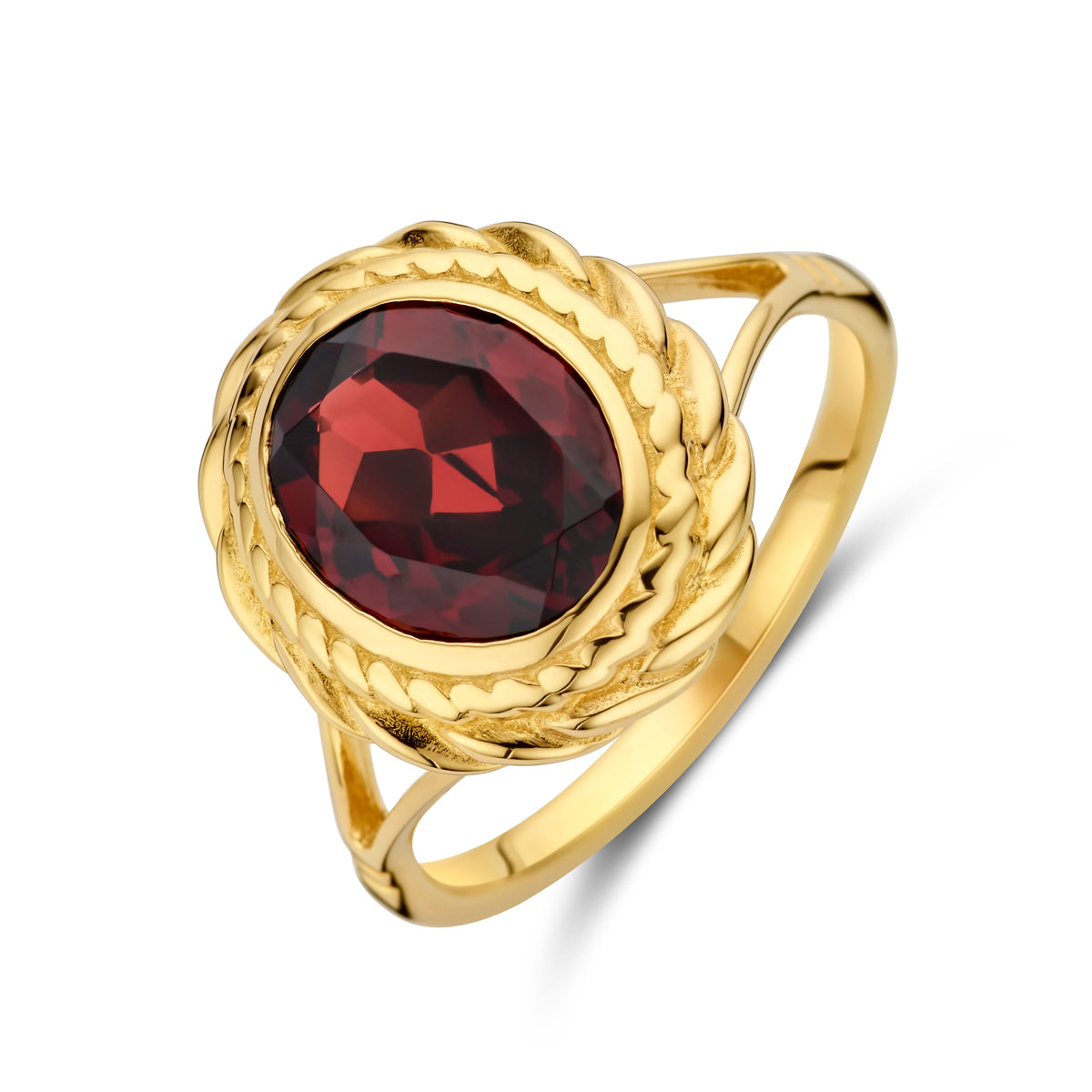 Schuin bovenaanzicht van de gouden ring met granaat van 14 karaat.