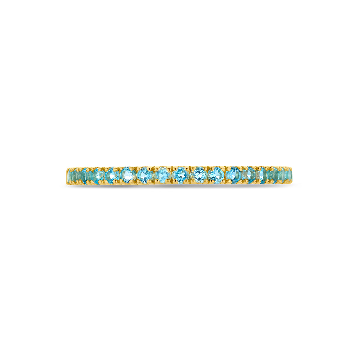 Bovenaanzicht van de gouden geboortesteen ring december met blauwe topaas van 14 karaat.