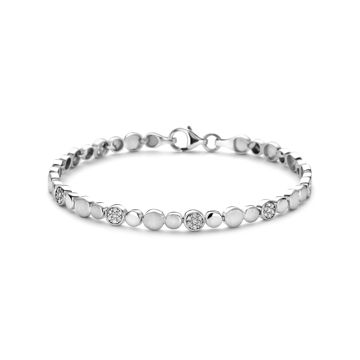Vooraanzicht van de zilveren armband met rondjes en zirkonia.